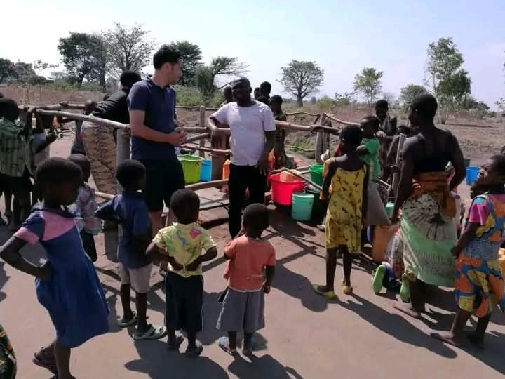 FORUD team engaging community members in rural Malawi